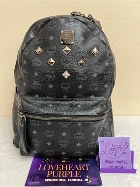 MCM Black Logo Studded Backpack with Silver Accents
